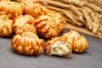 Delicious cream-filled profiteroles, golden and crisp, perfect for a sweet dessert treat