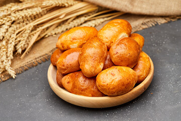 Golden-brown baked pies, perfect for a savory or sweet treat, ideal for any time of the day