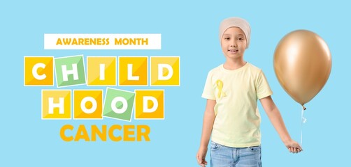 Little girl with golden ribbon and balloon on blue background. Childhood Cancer Awareness Month