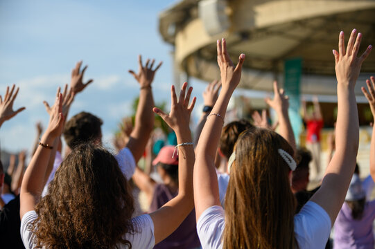 Young people dancing to Christian songs at Mladifest 2024, the annual youth festival in Medjugorje.