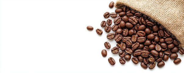 Organic coffee beans, spilling from burlap sack with copy space