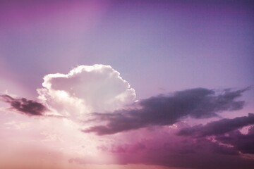 Obraz premium Fantasy sky with pink pastel clouds dreamy background