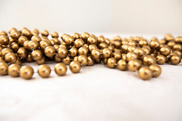 Golden strands of beads for Christmas