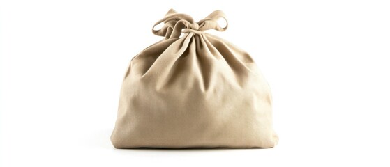 Obraz premium A Tied Beige Fabric Bag Isolated on a White Background