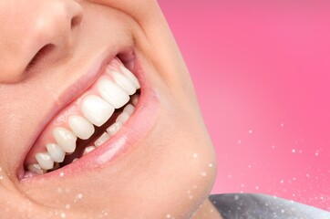 Happy woman's mouth with big smile teeth showing.