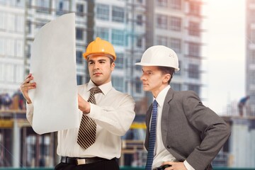 Two engineer working at construction site building project,