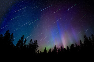 Spectacular display of meteors created in this composite photo that include Aurora along the...