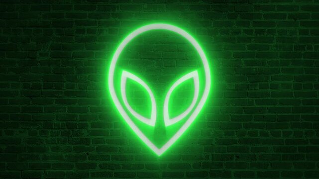 Green alien head face bright neon sign&nbsp;electric lamp flashing effects footage motion design symbol animation brick wall fog background clip
