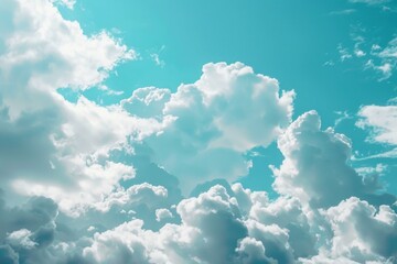 Fototapeta premium A plane soaring through a cloudy blue sky with a sense of freedom and adventure