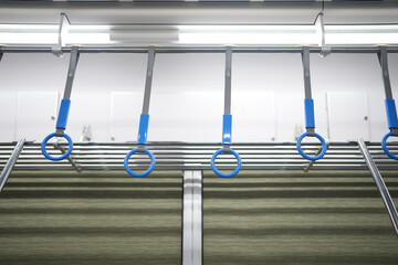 Inside Hanshin train running near Sannomiya in Kobe City, Hyogo Prefecture, Japan.