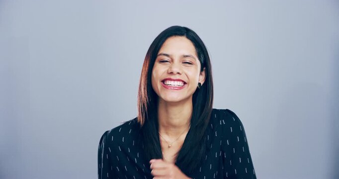 Female, laughing and joke with humour, face and happy for comic, funny and on studio background. Comedy, meme and smile for good time, enjoying and carefree with freedom, goofy and deep laughter