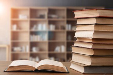 Set of reading books on table in library, education