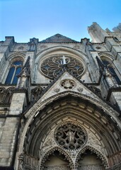 Gothic cathedral facade against blue sky