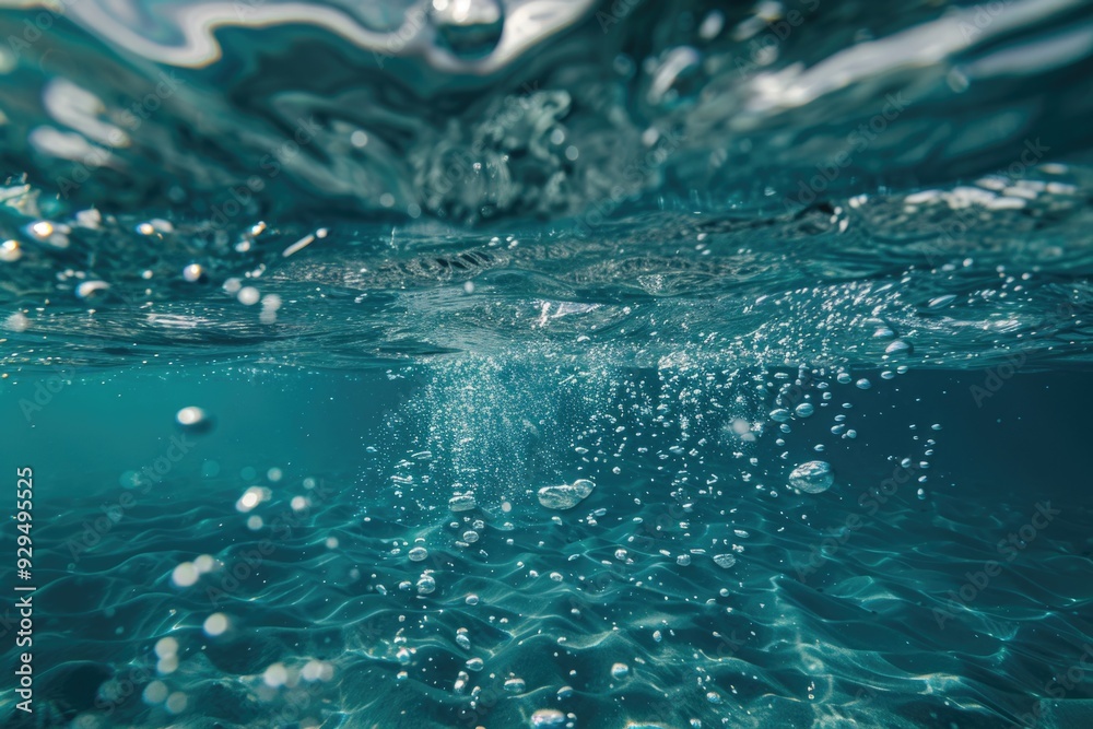 Poster a close-up view of water with bubbles forming on the surface