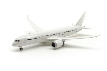 Model of a white airplane on a white surface