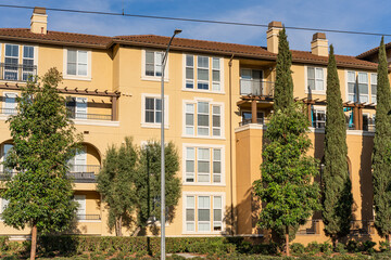 Exterior view of modern apartment building offering luxury rental units in Silicon Valley; Santa Clara, San Francisco bay area, California