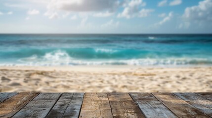 Wooden table in focus with a blurry beach background