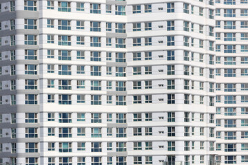 Yeongtong-gu, Suwon-si, Gyeonggi-do, South Korea - April 17, 2022: Windows and white walls of a newly built high-rise officetel at Gwanggyo New Town