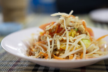 Green papaya salad Thai cuisine spicy delicious. Famous Thai food