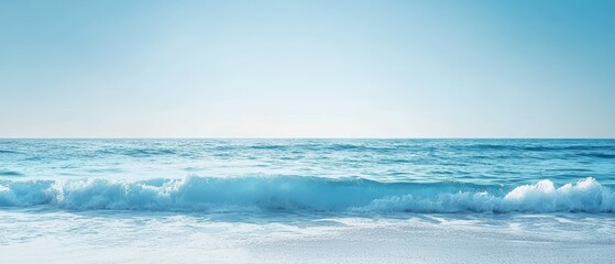 Fototapeta premium A tranquil blue ocean scene with soft waves and a clear sky