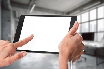 A businessman hands holds digital tablet blank screen