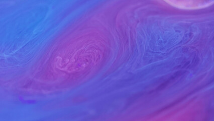 Neon smoke. Ink galaxy. Defocused blue purple violet color mixing gradient paint flowing magic brilliance vapor shimmer oil drop abstract art background.