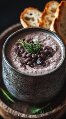 Lentil soup, served in a bowl with whole grain bread, on a rustic table, bright overhead lighting