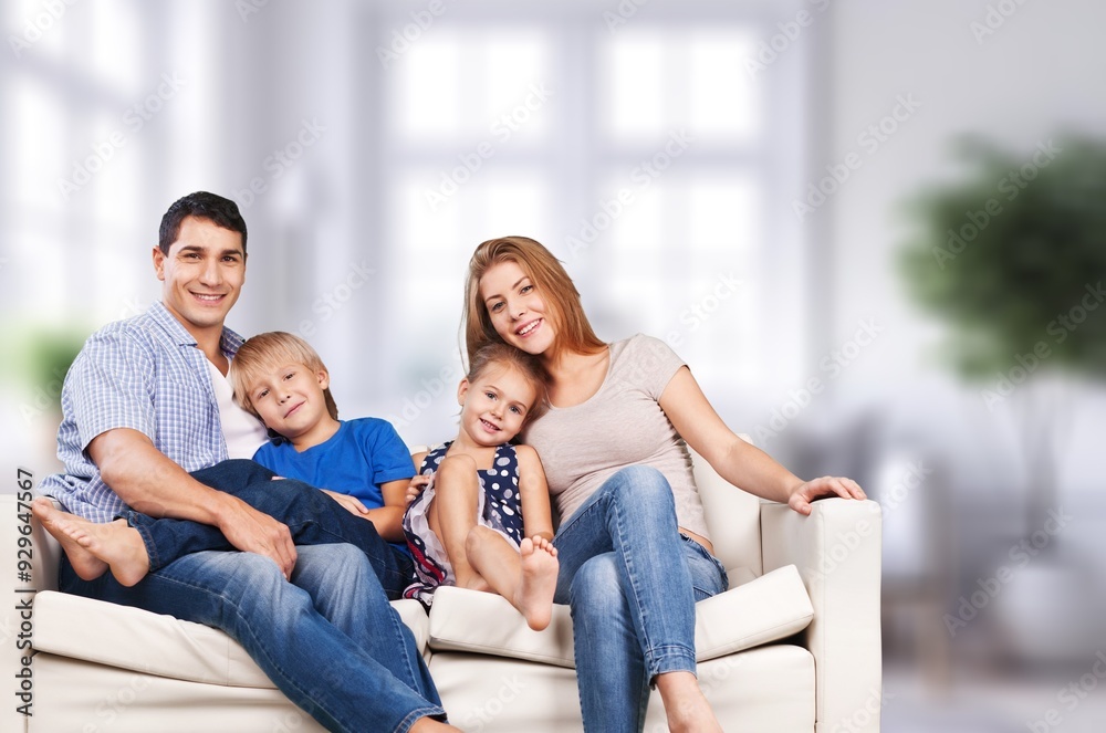 Poster Happy young family relax at home