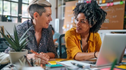 LGBTQ professional collaborating with a colleague on a project, modern office, diverse team, inclusive and productive work environment, engaging and focused discussion