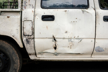 rust on old car body, corrosion on metal part of car, door handle