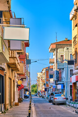 Fototapeta premium Chanakkale, Colorful streets with old beautiful houses and souvenir shops and restaurants