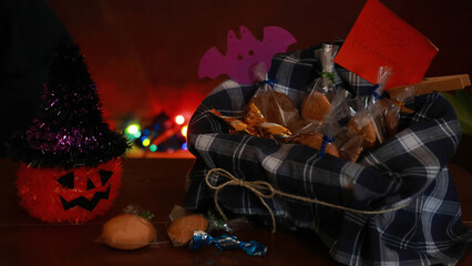 Sparkling nighttime illumination of Halloween party decorations