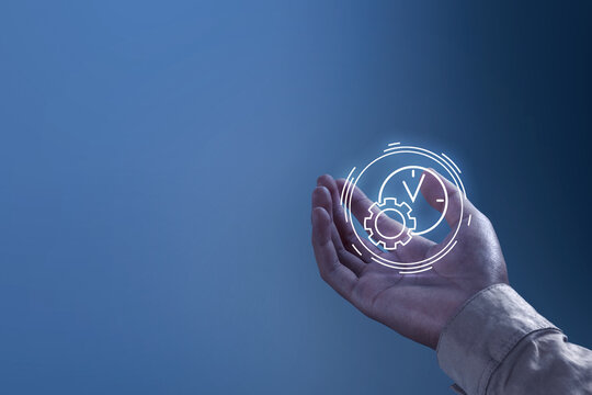 A hand holding a virtual clock
