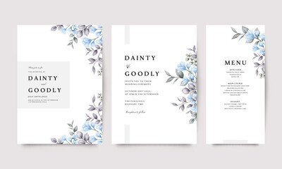 Wedding invitations with blue flowers, leaves and details of ceremony and reception.