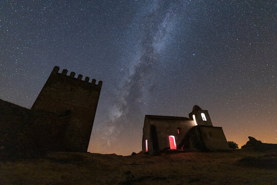 A castle illuminated by starlight
