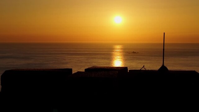Fiery Orange Sunset Over Mediterranean Sea