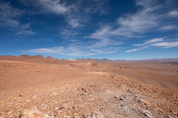 Driving east on Route 27 in the Atacama Desert you see amazing sights like the stunning  views across the “Monges de La Pacana” from the Paso Jama, Chile. 