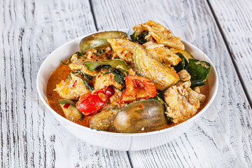Thai red spicy curry with chicken