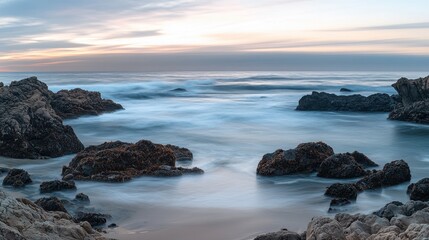 Serene Seascape with Smooth Rocks and Silky Water at Sunset.
