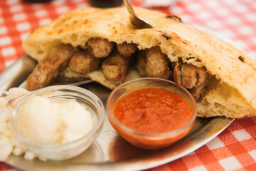 sandwich with sausage and cheese