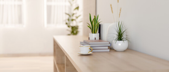 A wooden hallway sideboard or cabinet in a bright minimal interior room. a side view image