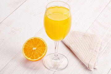 Sweet fresh orange juice in the glass