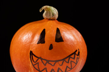 Halloween pumpkin on a black background. Halloween Sale