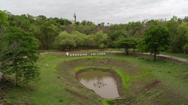 Aerial top view of Kradong Volcano with forest trees in Buriram, Thailand. Tourist attraction landmark. Nature landscape background