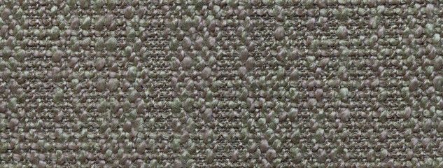 Texture dark green background from woven textile material with wicker pattern, macro. Vintage olive fabric cloth