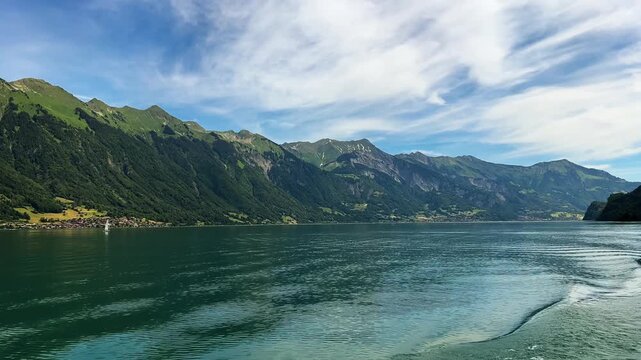 Sailing Across Thun Alpine Lake In The Bernese Oberland, Switzerland. Wide Shot