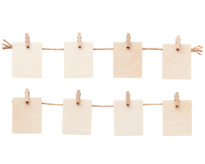Wooden clips holding blank cards on a string, perfect for notes, messages, or craft projects in a minimalistic style.