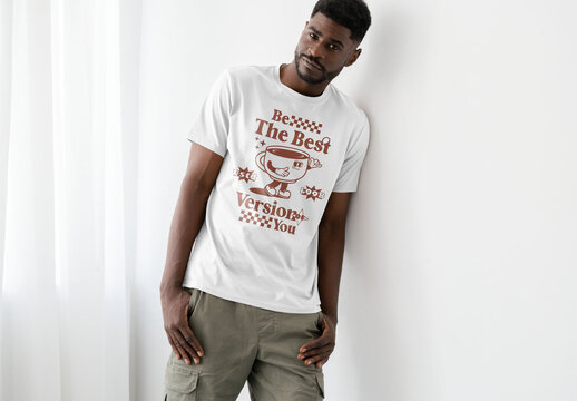Mockup Of Man In Customizable T-Shirt Leaning Against Wall