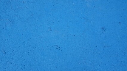 Rough texture image of dark blue floor. Abstract dark blue concrete texture background. Dark blue grungy backdrop. 