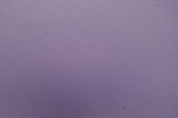 Close up of muted grey mauve painted wall